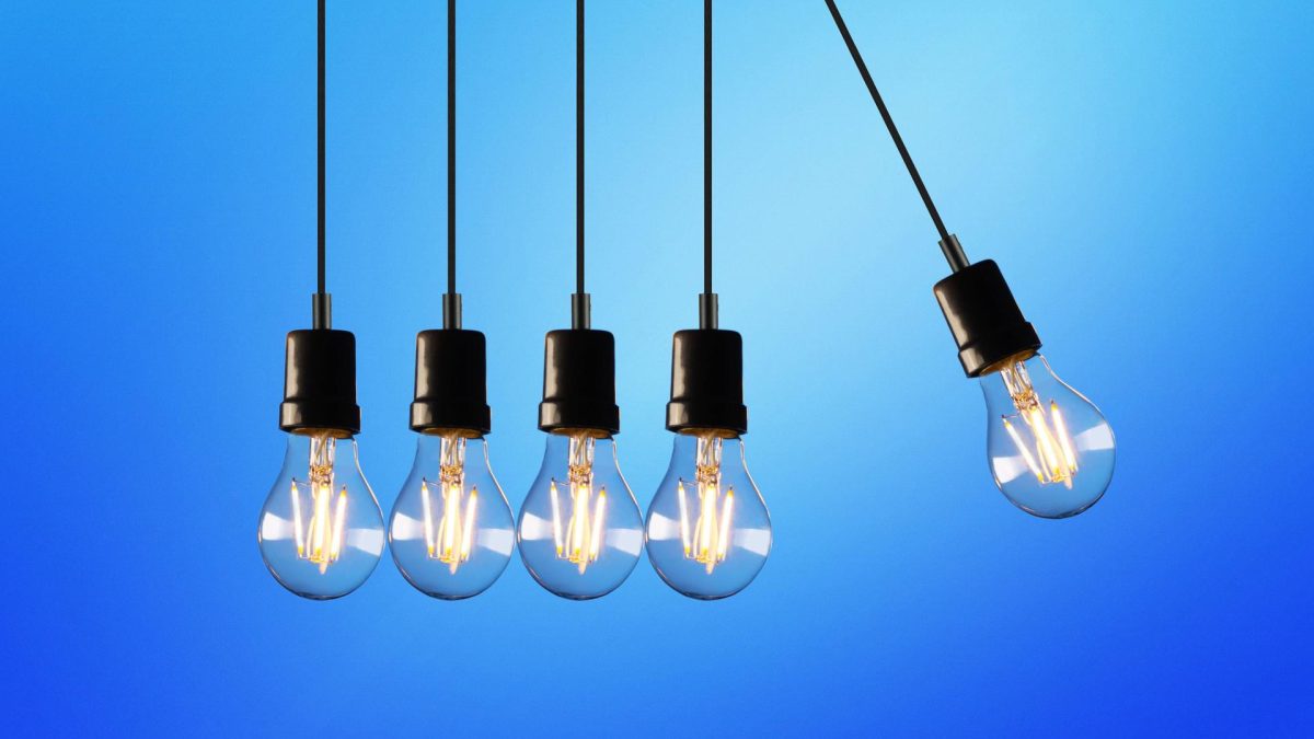 Illuminated light bulbs symbolize innovation amidst laws on artificial intelligence debate.